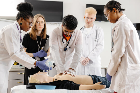Medical Students Practicing CPR on a Dummy