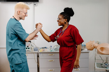 Medical Professionals High Five in Hospital Room