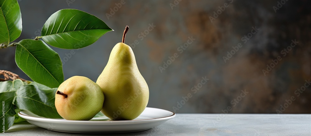 Aufkleber fresh bio pear with leaves on the plate gray stone table. creative banner. copyspace image