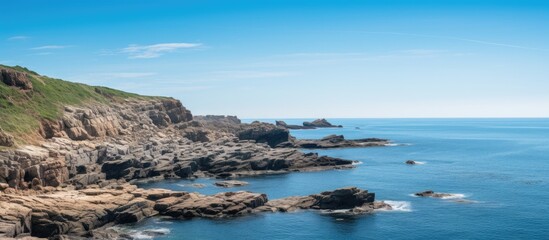 Clear sky with sea and rocks. Creative banner. Copyspace image