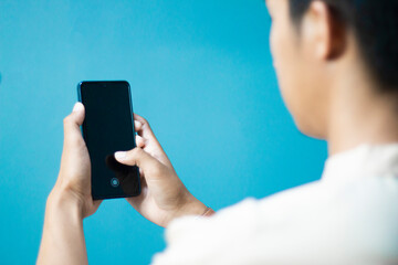 Businessman using mobile phone close-up, isolated image ,communication concept , fingerprint scanning strip