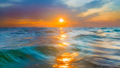 Obraz premium sun rays on sea water, abstract bright background of ocean waves at sunset closeup, summer vacation