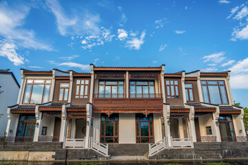 Obraz premium Majestic Traditional Chinese Architecture Under Blue Sky