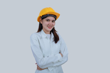Asian engineer worker woman or architect with yellow safety helmet standing on isolated white background, construction concept, Engineer, Industry.