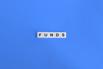 Word Funds. Collective Investments. Text on Block Letter Tiles on Yellow Background. Minimalist Aesthetics.