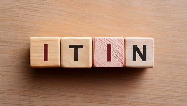Wood blocks with abbreviation text ITIN - Individual taxpayer identification number. Top view