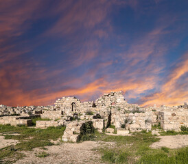 Amman city landmarks-- old roman Citadel Hill, Jordan. Against the background of a beautiful sky with clouds