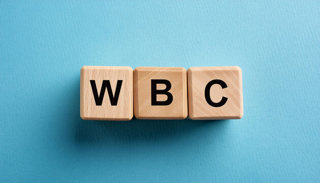 Wood cubes with abbreviation text WBC. White Blood Cells; World Boxing Council. Top view.