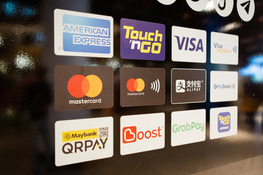 KUALA LUMPUR, MALAYSIA - APRIL 23, 2022: A payment machine accepting cashless payments from multiple companies.