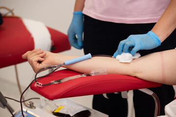 Laboratory and blood analysis concept. Close up cropped shot of professional nurse in gloves,...