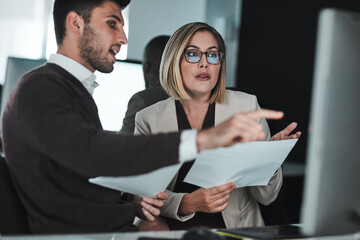 Business people, meeting and teamwork with documents, computer and brainstorming with idea, talk or...