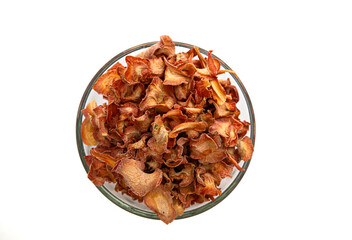 Dehydrated red carrot flakes or slice on transparent bowl