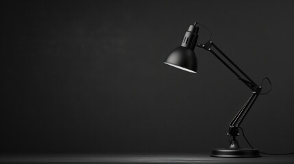A table lamp contrasts with a bright black background. Looks outstanding and bright Create a cheerful and lively atmosphere. There is space left for text.