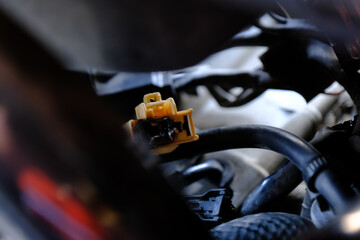 Check the electrical cable plug on the motorcycle.	