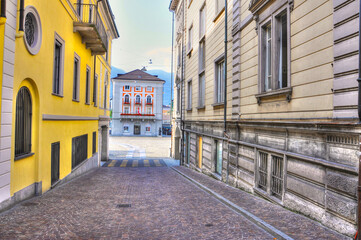 Cobblestone Road with Colorful Houses in City of Locarno, Ticino, Switzerland.