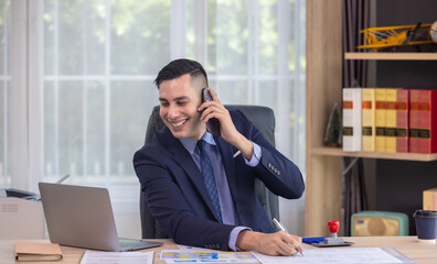 Businessman on Phone in Office