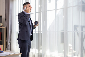 Businessman on Phone in Office