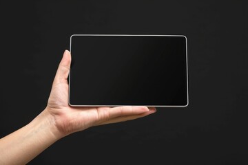 A person holding a tablet computer, ideal for use in digital content, online shopping, or educational settings