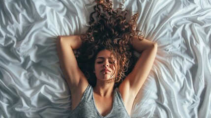 Fototapeta premium Woman lying stressed on the bed 