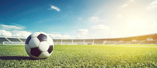soccer field and stadium rugby ball and soccer ball at the stadium. Creative banner. Copyspace image