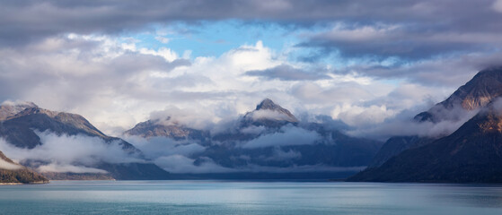 Dramatic Cloudy Morning over Alaska Coast. Nature Background