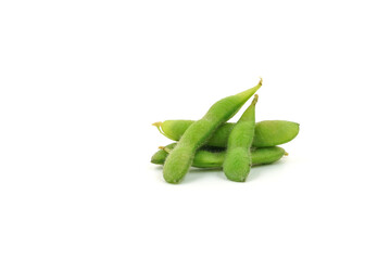 Fresh edamame soybeans and pods isolated on white background.