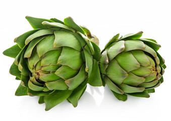 Fototapeta premium two green artichokes on a white background 1