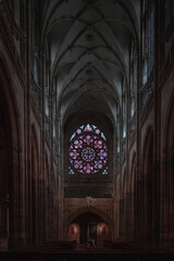 Obraz premium Gothic cathedral interior with stained glass window