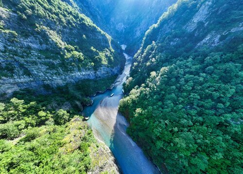 Aerial image of Shala River canyon and the clear blue waters in northern Albania. 