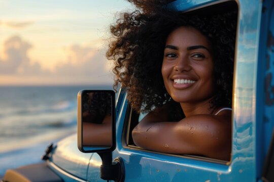 Woman enjoying scenic beach view from jeep window on african american female travel adventure trip - Powered by Adobe