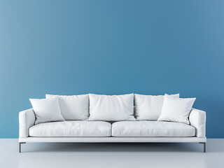 White leather sofa positioned before a serene blue wall adorned with plush cushions