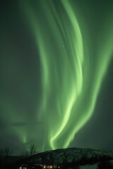 The aurora borealis lights up the night sky with a vibrant display of colored lights