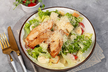 Salad bowl with chicken breast, rice, tomatoes, cucumbers and avocado Boiled egg