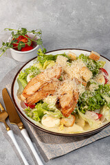 Salad bowl with chicken breast, rice, tomatoes, cucumbers and avocado Boiled egg