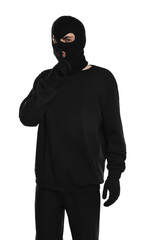 Thief in balaclava showing hush gesture on white background