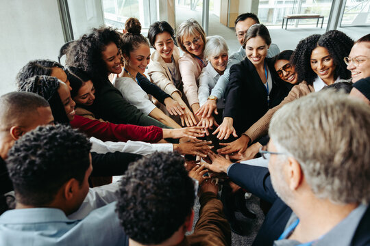 Group of diverse people with teamwork and inclusion at a conference setting - Powered by Adobe
