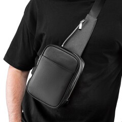 Detailed view of fashionable black leather crossbody bag decorated with white metal zippers...
