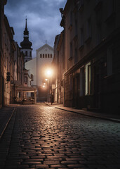 ciemna brukowana uliczka w nocy w mieście © Henryk Niestrój