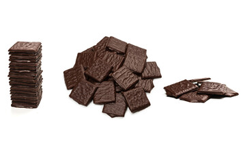 Dark chocolate candies isolated on white background.