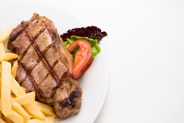 Bife de chorizo con papas fritas, carne argentina