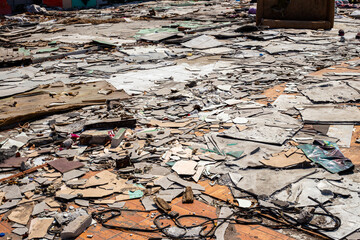 Fragments of a destroyed building on the ground. Earthquake, disaster.