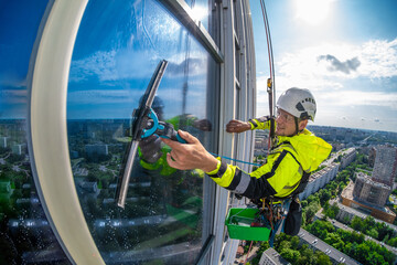 Rope access specialists clean buildings