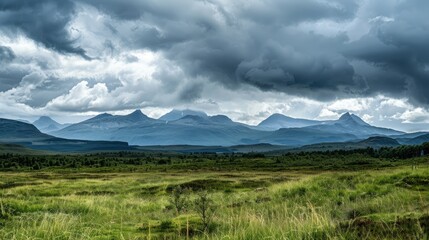 Fototapeta premium Mountains are visible in the distance amid cloudy weather