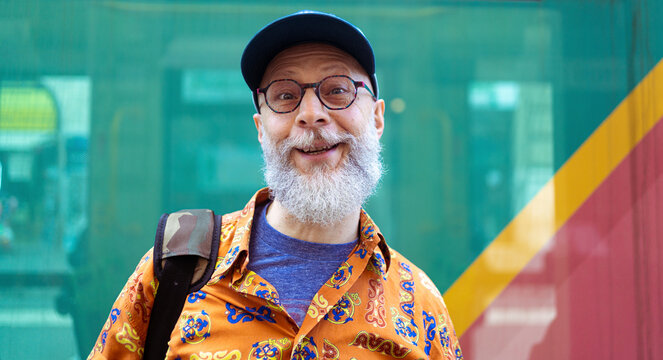 Senior man smiling in vibrant casual wear