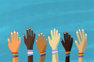 Diverse hands raised in celebration of Pride Day