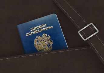 Armenia Passport in a brown leather travel bag 3D Illustration - Armenian