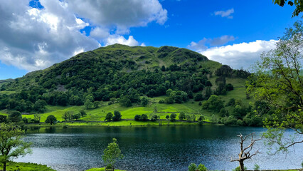 green mountain lake and blue sky