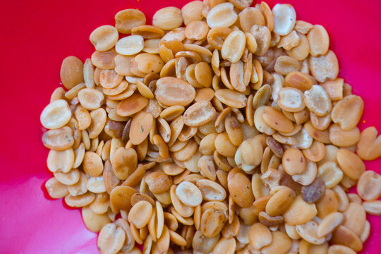 Split Roasted Coriander Seeds, popularly known as Dhana Dal or Sukh Mukh, isolated on a background.