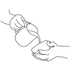 hands pour milk into a cup