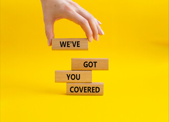 We have got you covered symbol. Concept words We have got you covered blocks. Beautiful yellow...